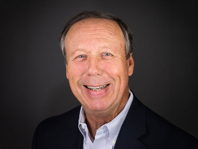 Studio image of older man smiling
