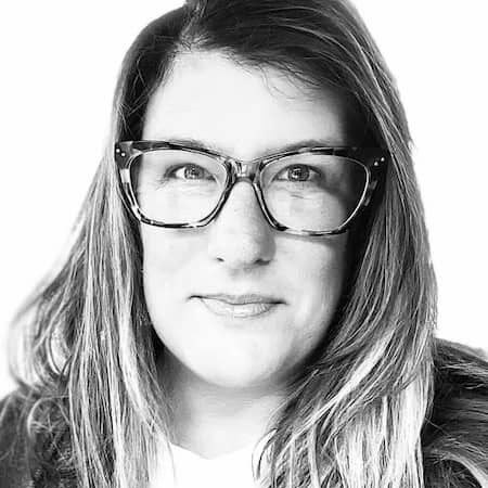 Black & white photo of woman with glasses
