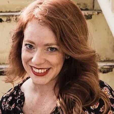 Smiling red haired woman