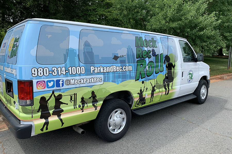Van with Meck Rec & Roll graphics