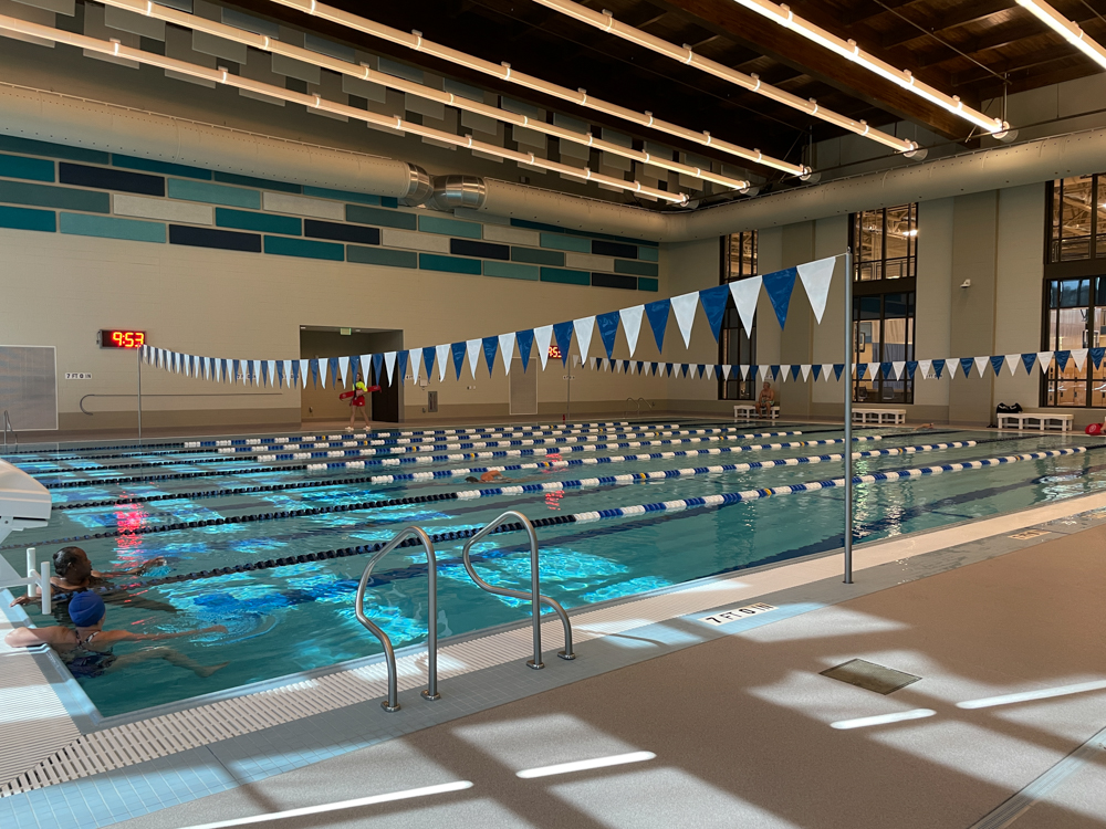 inside swimming pool with marked lanes