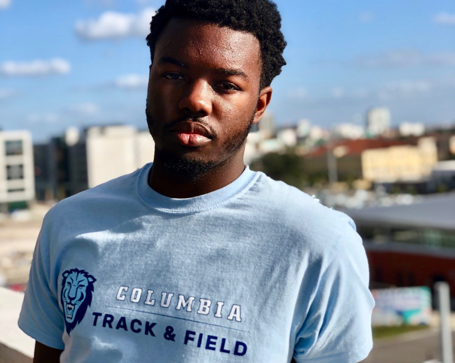 Charlotte Flights athlete Matthew Garrett in a Columbia Track & Field shirt